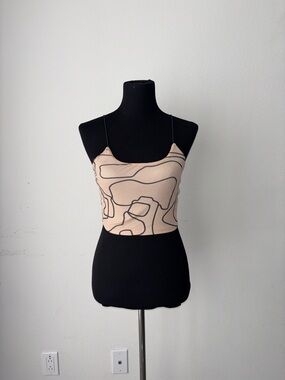 Cream tank top with black abstract design
